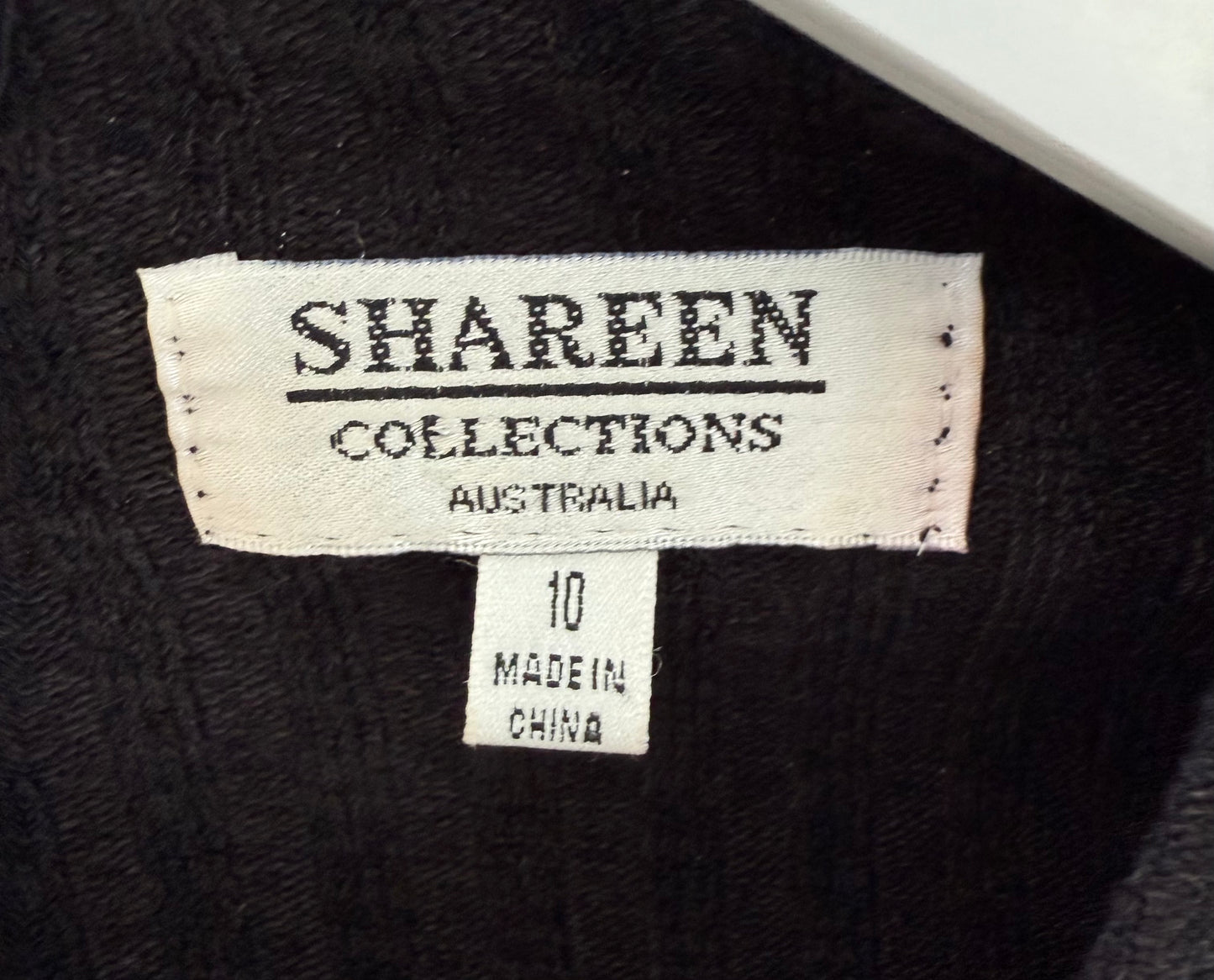SHAREEN COLLECTIONS Black Bodysuit