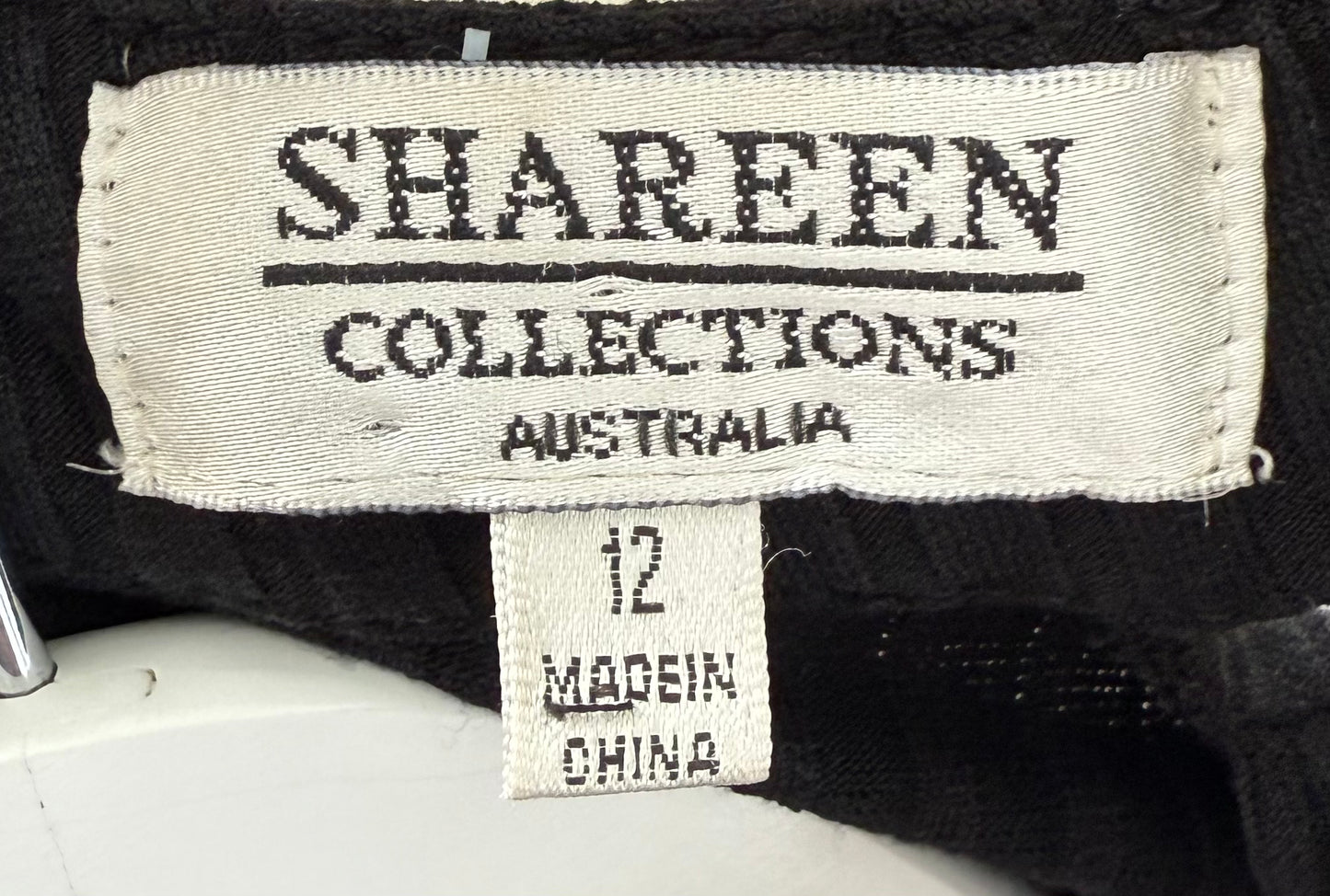 SHAREEN COLLECTIONS Black Bodysuit