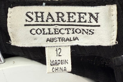 SHAREEN COLLECTIONS Black Bodysuit